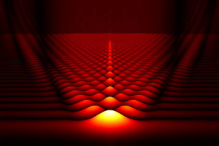 Illustration for article titled Sub-Atomic Particles Could Accelerate Themselves